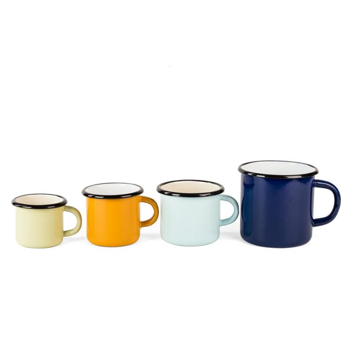 Set of different enamel mugs in various colurs