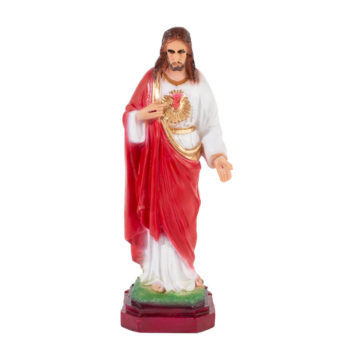 Estatua del Sagrado Corazón de Jesús señalando su corazón